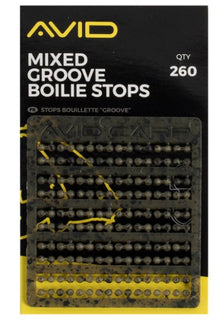 Стопери за протеинови топчета AVID MIXED GROOVE BOILIE STOPS, 260 броя с конусовидна форма за максимален камуфлаж.
